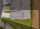 Aerial view of property lines, driveway, grassy area, and roof with vents at 2629 Irwell Way, Lawrenceville, GA 30044