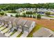 Aerial view of townhomes with attached garages and well-maintained front lawns at 2629 Irwell Way, Lawrenceville, GA 30044