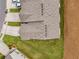 Aerial view of home with manicured lawn, driveway, and roof with vents at 2629 Irwell Way, Lawrenceville, GA 30044