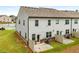 Back of building with an outdoor patio, lawn, and central air conditioning at 2629 Irwell Way, Lawrenceville, GA 30044