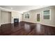 Spacious living room featuring a fireplace and hardwood floors at 2629 Irwell Way, Lawrenceville, GA 30044