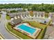 A refreshing community pool with lounge chairs, clubhouse, and street parking nearby at 2629 Irwell Way, Lawrenceville, GA 30044