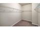 Spacious walk-in closet with ample shelving for organization and storage at 2629 Irwell Way, Lawrenceville, GA 30044
