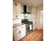 Well-equipped kitchen with stainless steel appliances, wooden countertops, and ample cabinet space at 5254 Corinth Dr, Stone Mountain, GA 30087