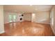 Open living room with fireplace and hardwood flooring. Plenty of natural light at 5254 Corinth Dr, Stone Mountain, GA 30087