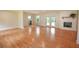 Spacious living room features beautiful hardwood floors and a fireplace at 5254 Corinth Dr, Stone Mountain, GA 30087
