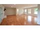 Open living room showcases hardwood flooring, neutral walls, and natural light at 5254 Corinth Dr, Stone Mountain, GA 30087