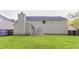 Spacious backyard with a well-maintained lawn and fenced perimeter at 6528 Carriage Ln, Stone Mountain, GA 30087