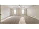 Large bedroom featuring neutral carpet and recessed lighting at 6528 Carriage Ln, Stone Mountain, GA 30087