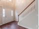 Welcoming entryway featuring a staircase and natural light from the front door and windows at 6528 Carriage Ln, Stone Mountain, GA 30087