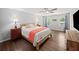 Bright bedroom with hardwood floors, a ceiling fan, and abundant natural light at 1373 Brawley Ne Cir, Brookhaven, GA 30319