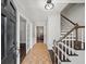 Welcoming foyer with hardwood floors, staircase, and neutral wall paint at 1373 Brawley Ne Cir, Brookhaven, GA 30319