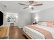 Spacious main bedroom with hardwood floors, ceiling fan, and abundant natural light at 1373 Brawley Ne Cir, Brookhaven, GA 30319