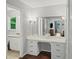 Bathroom vanity area with natural light and white cabinets at 1373 Brawley Ne Cir, Brookhaven, GA 30319