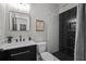 Stylish bathroom with modern vanity, tile shower, and elegant fixtures at 2490 S Carroll S St, Villa Rica, GA 30180