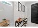 Modern bathroom with tiled shower, wood accents, and stylish decorative items at 2490 S Carroll S St, Villa Rica, GA 30180
