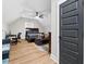 Bright bedroom featuring wood floor, desk, seating area, and spacious layout at 2490 S Carroll S St, Villa Rica, GA 30180