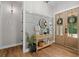 Stylish foyer with decorative console table and attractive front door decor at 2490 S Carroll S St, Villa Rica, GA 30180