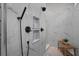 Modern walk-in shower with marble tile, rainfall showerhead, and built-in niche at 2490 S Carroll S St, Villa Rica, GA 30180