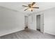 Bedroom featuring neutral carpet, ceiling fan, and closet at 3833 Paddington Trail, Rex, GA 30273
