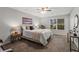 Comfortable bedroom with a large window offering natural light at 3833 Paddington Trail, Rex, GA 30273
