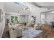 Open-concept living room with vaulted ceilings and plenty of space for entertaining at 3833 Paddington Trail, Rex, GA 30273