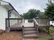Picture of the back deck featuring new stain and ample room for entertainment at 4706 Piney Grove Rd, Cumming, GA 30040