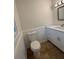 Updated bathroom with new fixtures and wood look tile flooring at 4706 Piney Grove Rd, Cumming, GA 30040