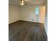Bedroom with new flooring and ceiling fan fixture, perfect for comfort and style at 4706 Piney Grove Rd, Cumming, GA 30040