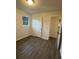 Bedroom showcasing hardwood floors and a closet at 4706 Piney Grove Rd, Cumming, GA 30040