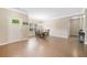 Bright dining room featuring hardwood floors and an elegant chandelier at 110 Collingwood Lndg, Covington, GA 30016