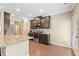 Well-lit kitchen with granite countertops, stainless steel appliances, and ample cabinet space at 110 Collingwood Lndg, Covington, GA 30016