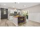 Modern kitchen with an island, stainless steel appliances, and stylish pendant lighting at 1766 Ware Ave, Atlanta, GA 30344