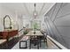 Open-concept dining room with stylish decor and seamless flow to the living area at 205 Maplewood Dr, Roswell, GA 30075