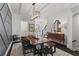 Dining room with hardwood table, chair seating, and decorative furnishings at 205 Maplewood Dr, Roswell, GA 30075