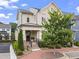 Charming two-story home with a welcoming front porch and beautifully landscaped yard at 205 Maplewood Dr, Roswell, GA 30075