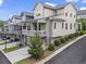 Townhome exterior featuring multiple levels and private balconies, showcasing the community's design at 205 Maplewood Dr, Roswell, GA 30075