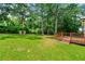 Expansive backyard featuring large deck and lush green lawn at 381 Warner Se St, Marietta, GA 30060