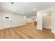 Open-concept living room with hardwood floors, recessed lighting and kitchen view at 381 Warner Se St, Marietta, GA 30060