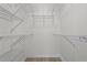 Walk-in closet with multiple levels of wire shelving at 401 16Th Nw St # 1357, Atlanta, GA 30363