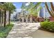 Beautiful outdoor community area with a view of the building, trees and shade at 401 16Th Nw St # 1357, Atlanta, GA 30363