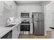 Modern kitchen featuring stainless steel appliances and sleek countertops at 401 16Th Nw St # 1357, Atlanta, GA 30363