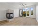 Bright living room with floor-to-ceiling windows and a modern fireplace at 401 16Th Nw St # 1357, Atlanta, GA 30363