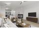 Bright living room featuring a modern fireplace and contemporary furnishings at 401 16Th Nw St # 1357, Atlanta, GA 30363