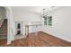 Bright foyer with hardwood floors, a modern chandelier, and a view of the stairs at 4363 Old Mabry Road Northeast Ne Rd, Roswell, GA 30075
