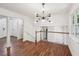Spacious foyer with hardwood floors and natural lighting from a large window at 4363 Old Mabry Road Northeast Ne Rd, Roswell, GA 30075