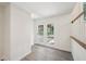 Hallway featuring wooden floor, and natural light through French doors at 4363 Old Mabry Road Northeast Ne Rd, Roswell, GA 30075