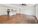 Open concept kitchen and living room with hardwood floors and white cabinets at 4363 Old Mabry Road Northeast Ne Rd, Roswell, GA 30075
