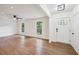 Spacious living room with hardwood floors, shiplap accent wall, and natural light at 4363 Old Mabry Road Northeast Ne Rd, Roswell, GA 30075