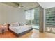 Bedroom with great natural light and views of the pool at 943 Peachtree Ne St # 902, Atlanta, GA 30309